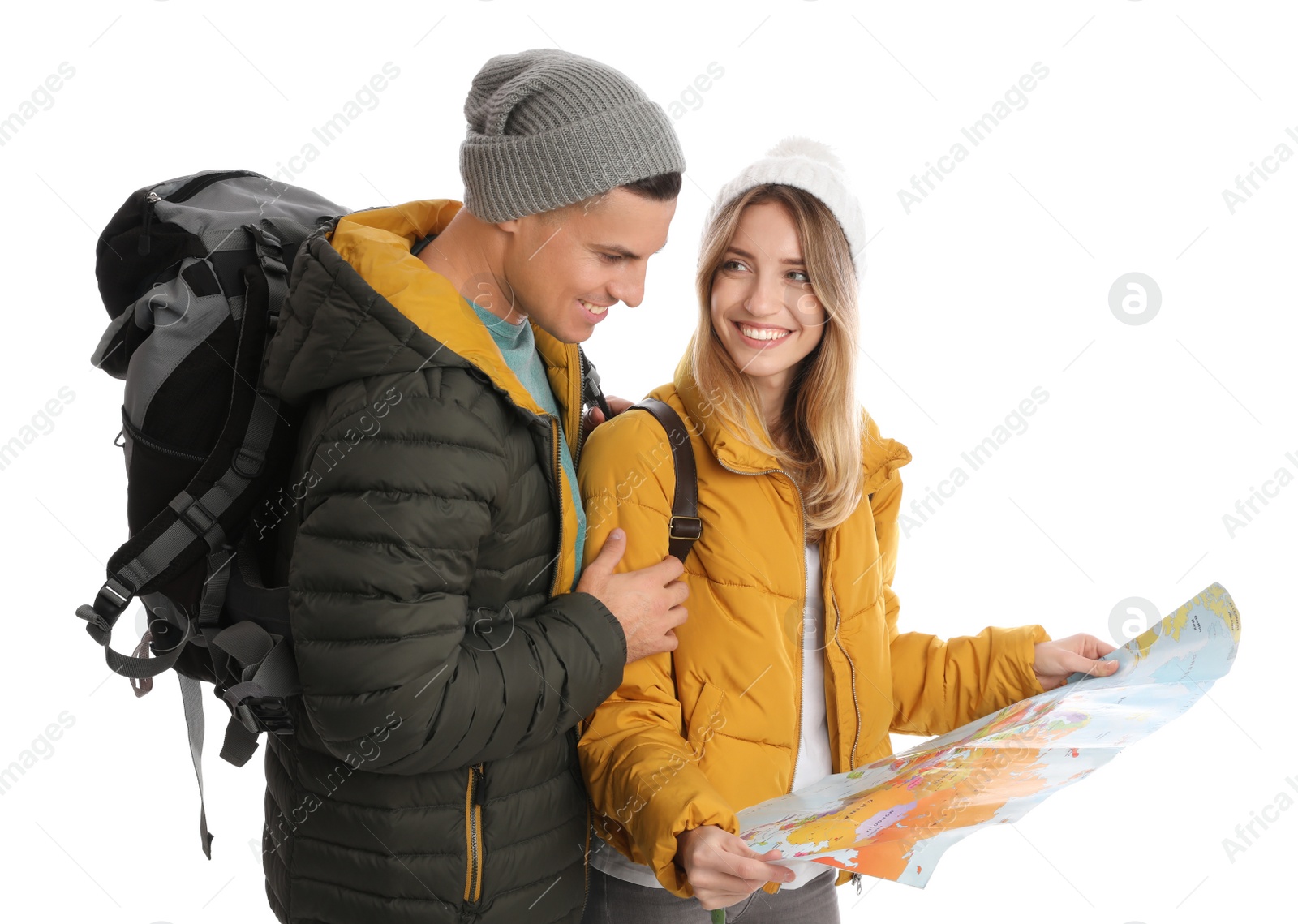 Photo of Couple with map on white background. Winter travel