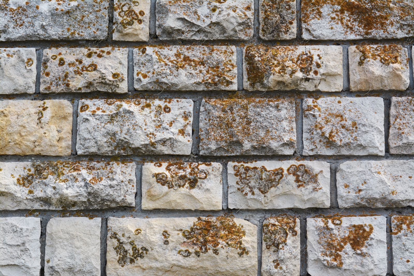 Photo of Texture of old stone wall as background, closeup