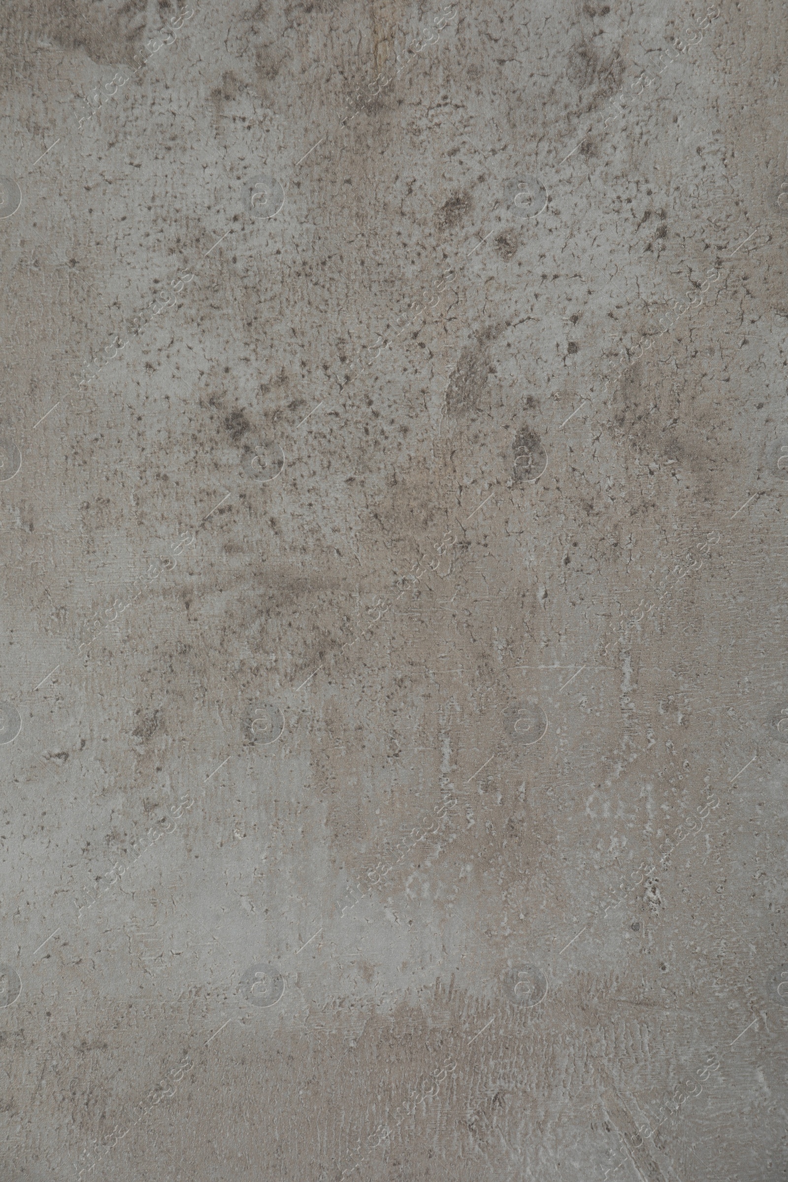 Photo of Texture of light grey stone surface as background, closeup