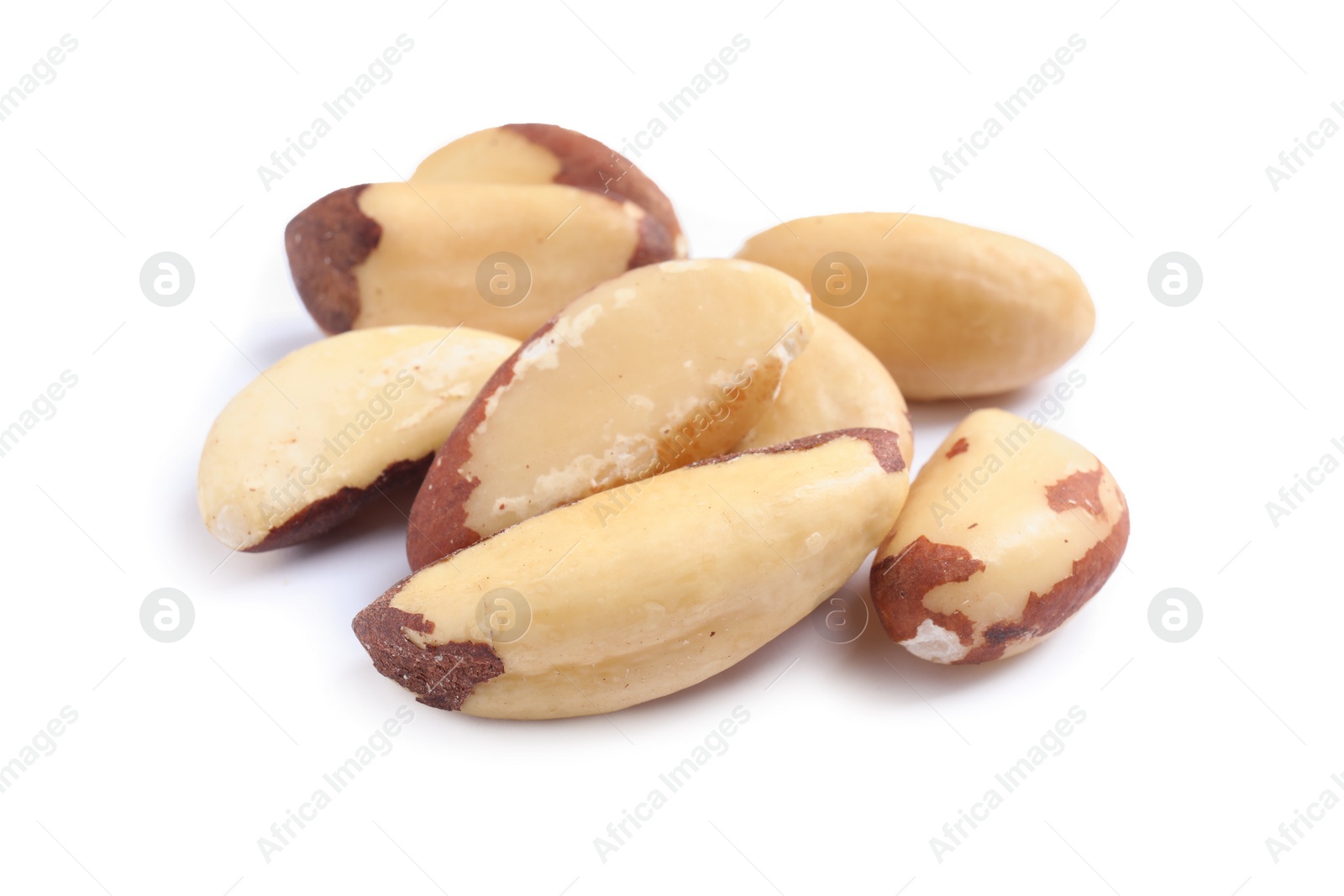 Photo of Delicious Brazil nuts on white background. Healthy snack