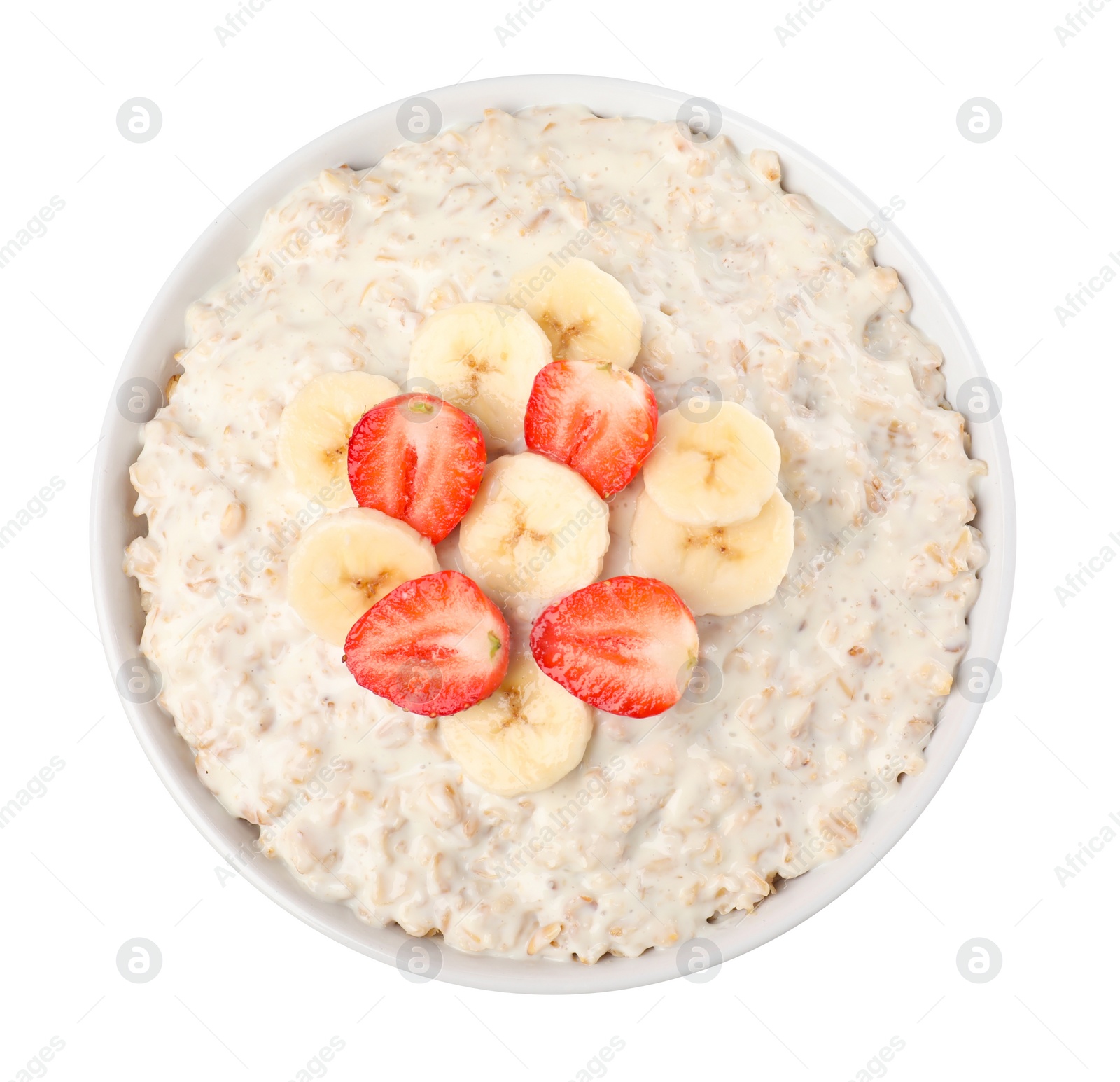 Photo of Tasty boiled oatmeal with banana and strawberries in bowl isolated on white, top view