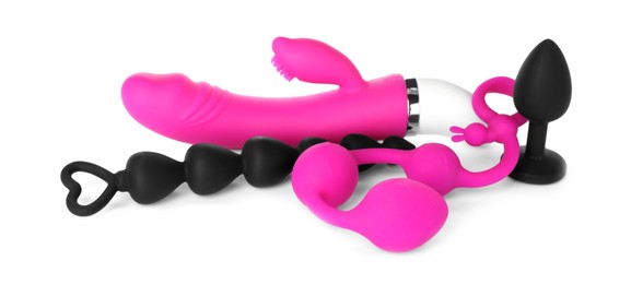Set of different sex toys on white background