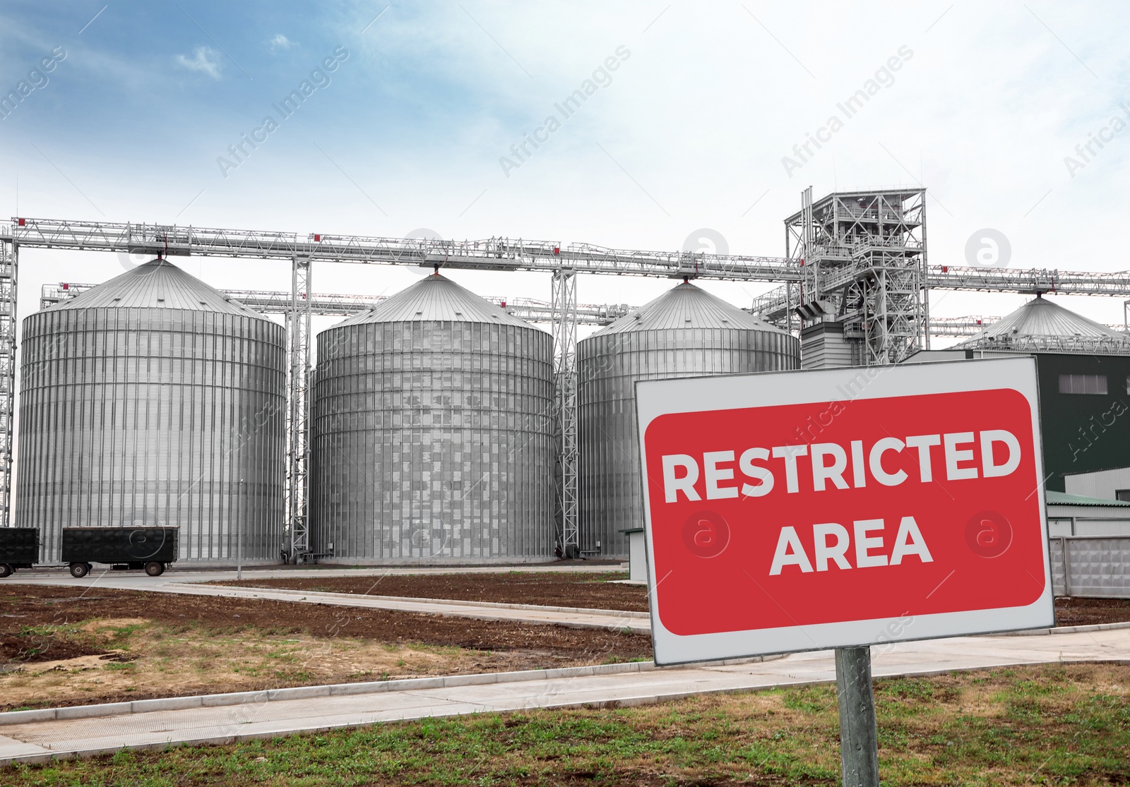 Image of Sign with text Restricted Area near granaries outdoors