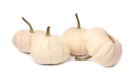 Many ripe beige pumpkins isolated on white