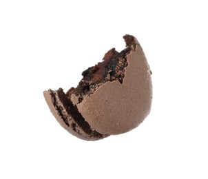 Photo of Half of delicious chocolate macaron isolated on white