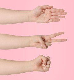 Image of People playing rock, paper and scissors on pink background, closeup