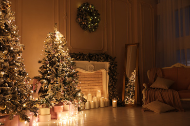 Festive room interior with beautiful Christmas trees