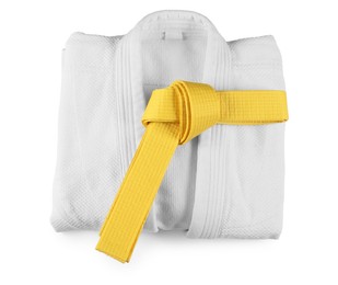 Photo of Martial arts uniform with yellow belt isolated on white, top view