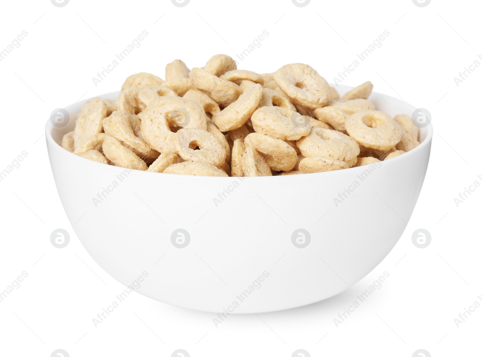 Photo of Tasty cereal rings in bowl isolated on white