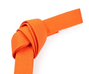 Photo of Orange karate belt isolated on white. Martial arts uniform