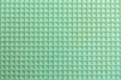 Tasty wafer as background, closeup. Crispy food