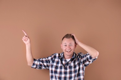 Photo of Portrait of handsome man on color background