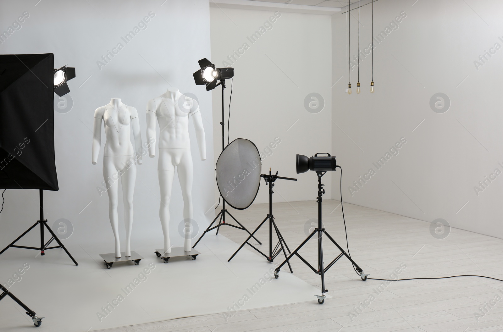 Photo of Modern ghost mannequins in professional photo studio