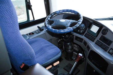 Photo of View of professional driver's cab in modern bus