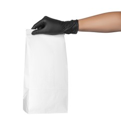 Photo of Woman holding paper bag on white background, closeup