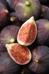 Fresh ripe figs as background, top view