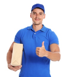 Happy young courier with parcel on white background