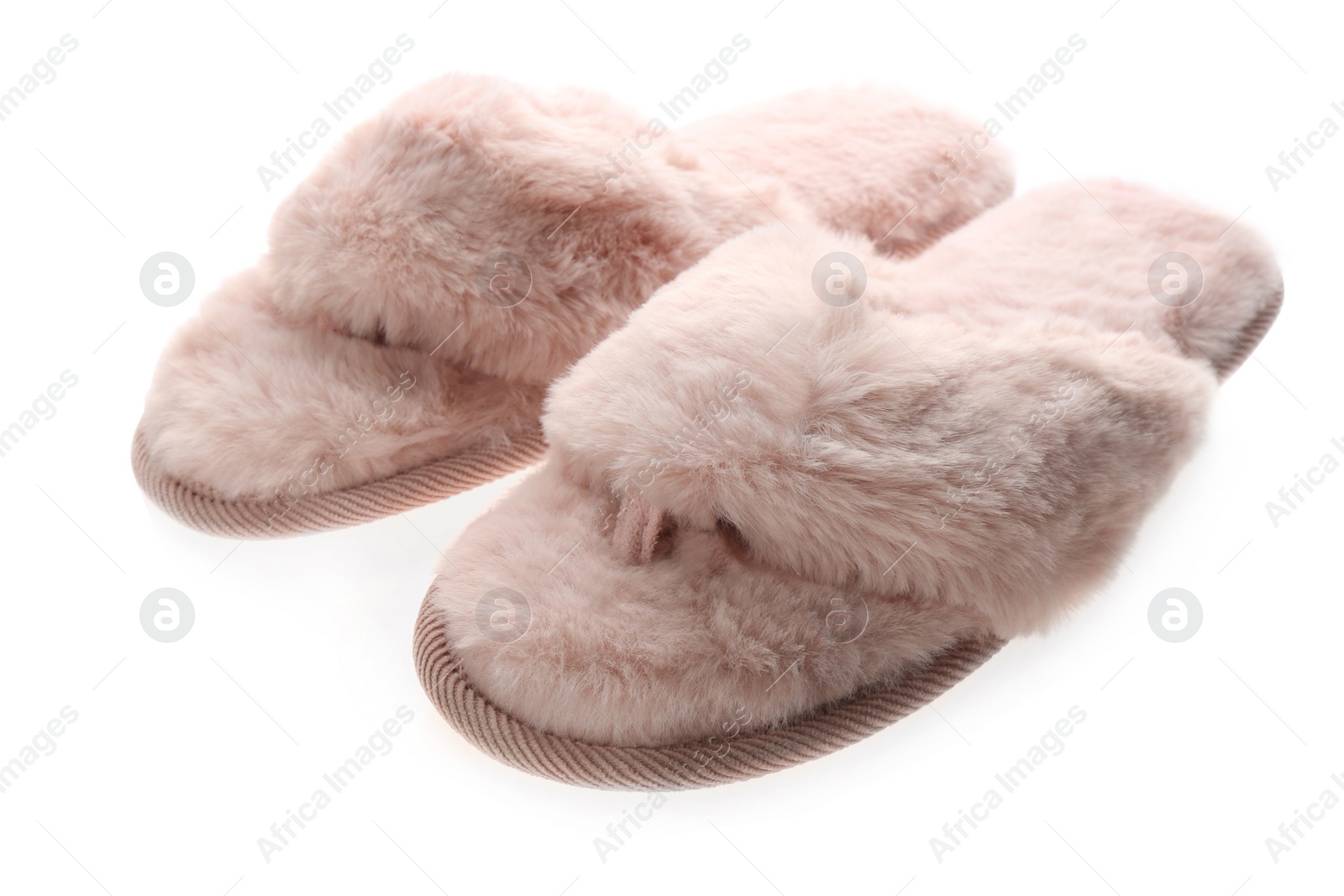 Photo of Pair of stylish soft slippers on white background