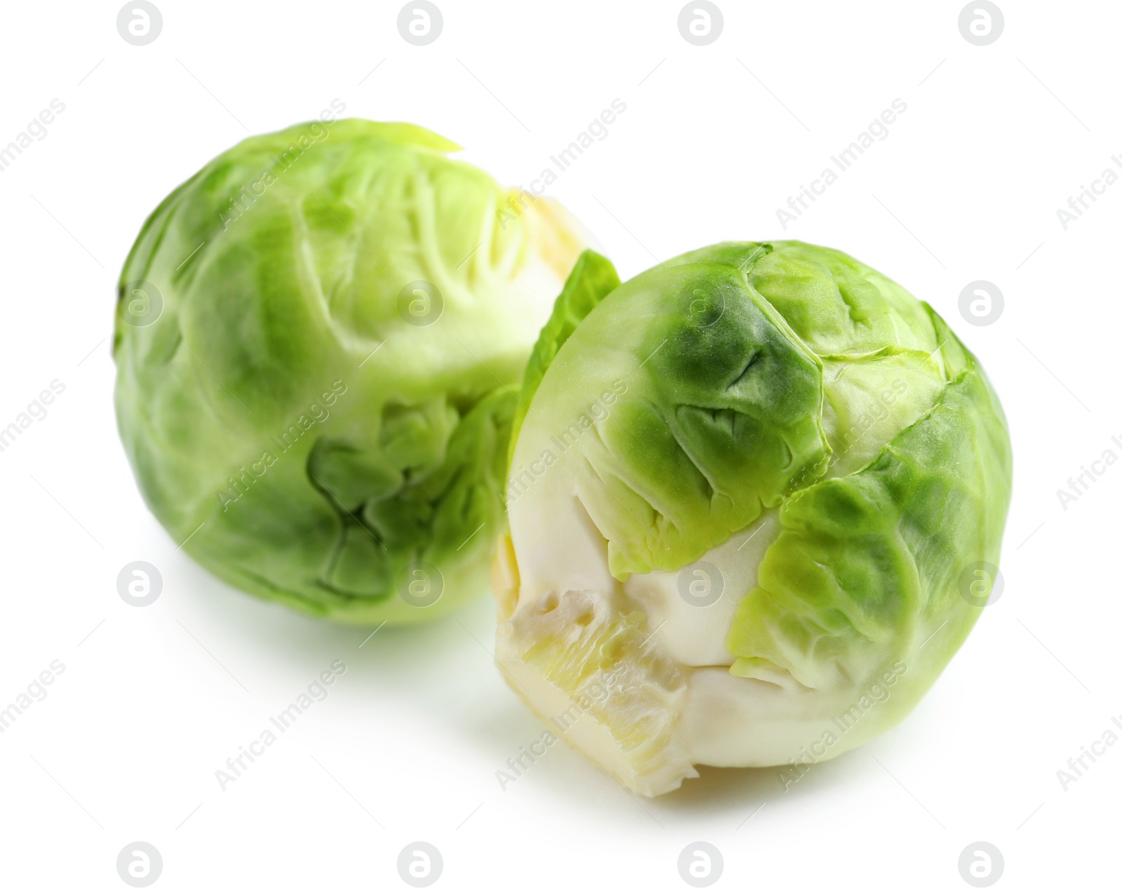 Photo of Fresh tasty Brussels sprouts on white background