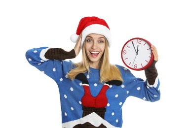 Photo of Woman in Santa hat with clock on white background. New Year countdown