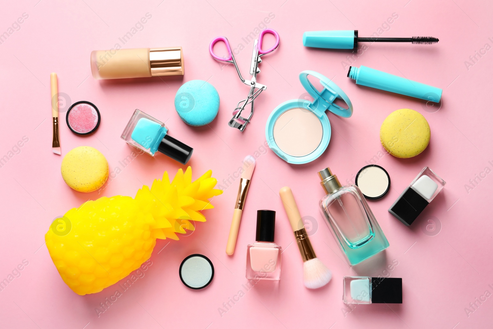 Photo of Flat lay composition with decorative cosmetics on color background