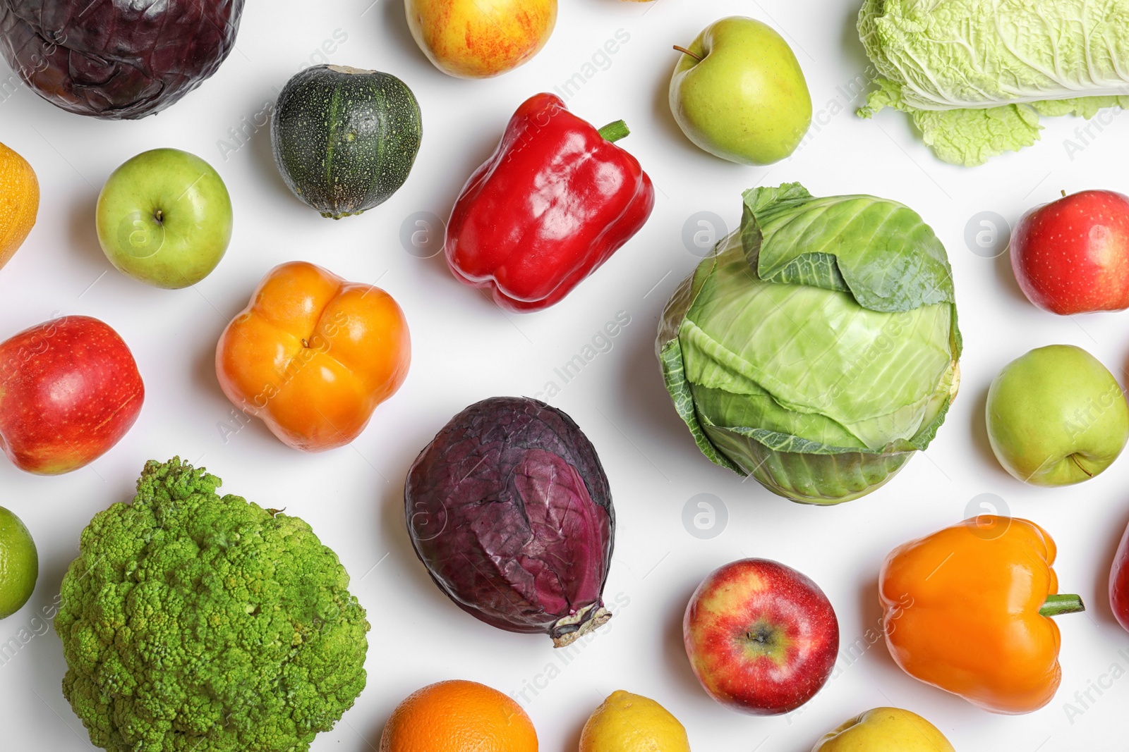 Photo of Flat lay composition with ripe fruits and vegetables on white background