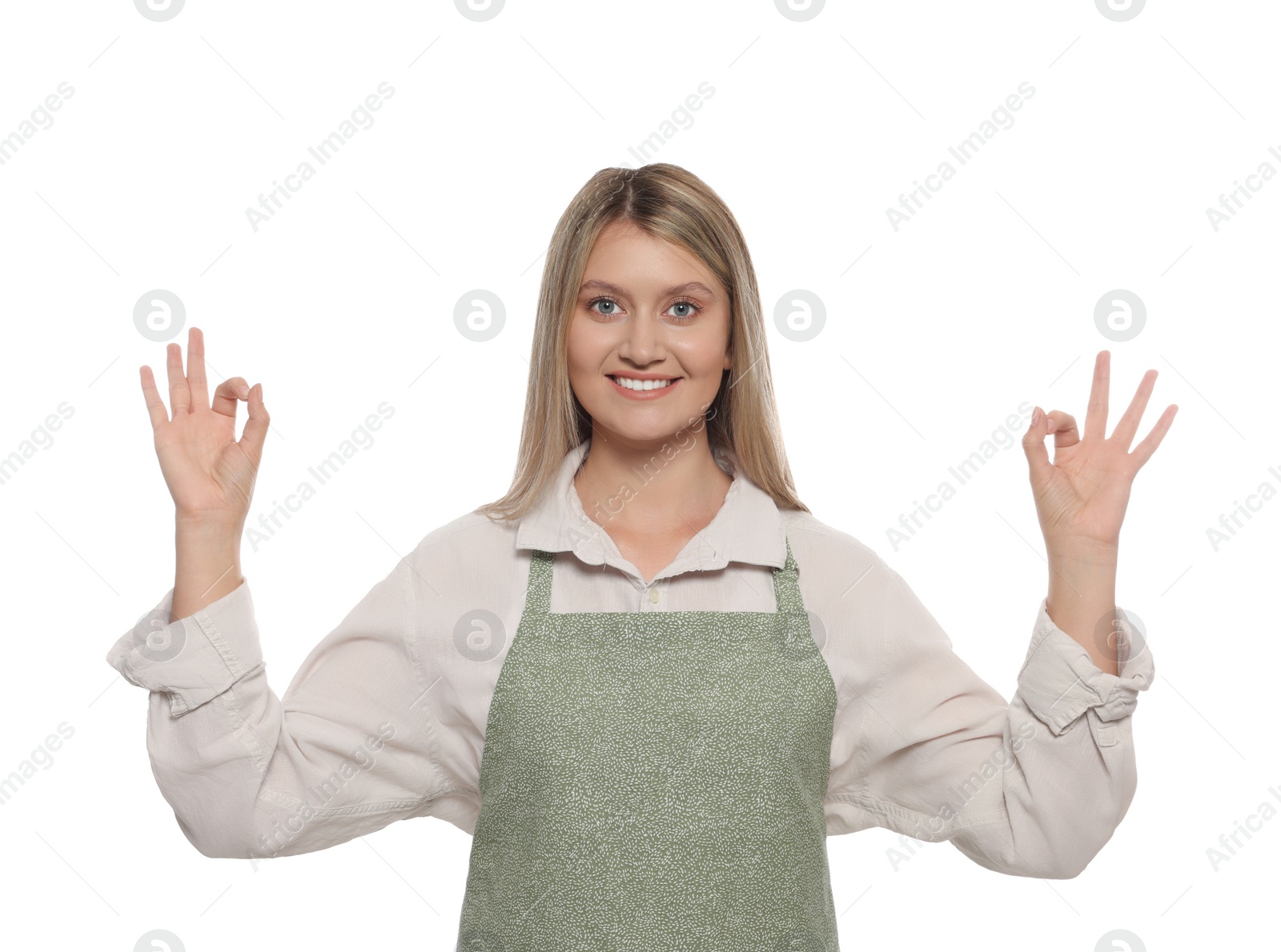 Photo of Beautiful young woman in clean apron on white background