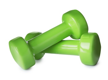 Color dumbbells on white background. Home fitness