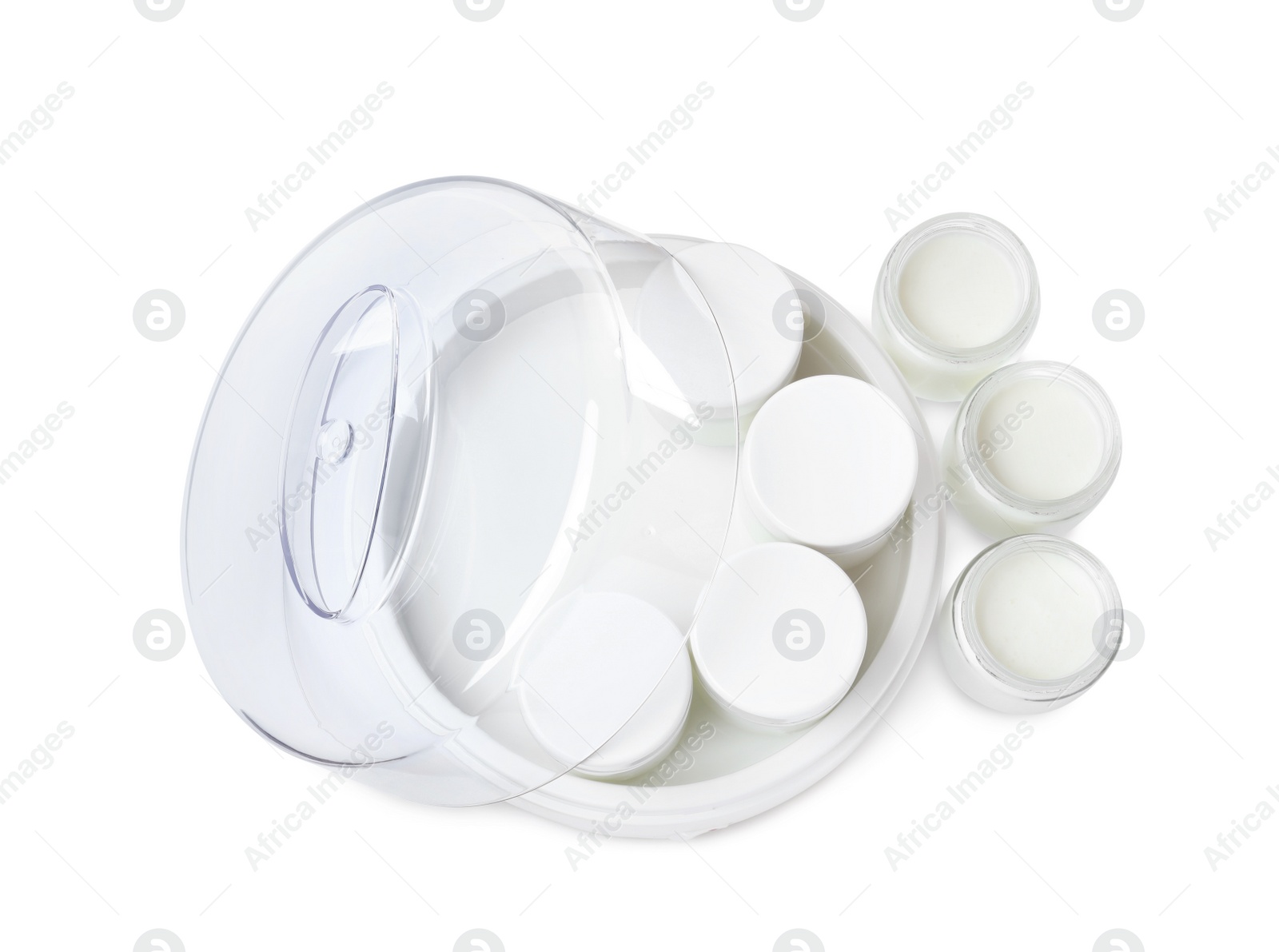 Photo of Modern yogurt maker with full jars on white background, top view