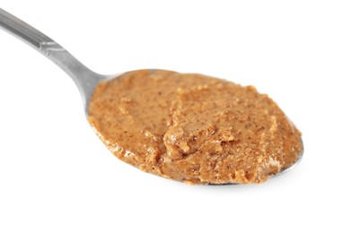 Photo of Delicious nut butter in spoon isolated on white