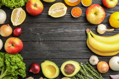 Flat lay composition with natural products and space for text on wooden background. Home remedies for asthma