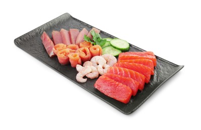 Photo of Delicious sashimi set of tuna, salmon and shrimps served with cucumbers and parsley isolated on white