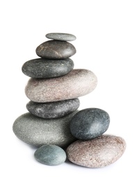 Photo of Stack of zen spa stones on white background