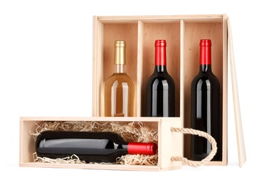 Wooden gift boxes with wine isolated on white