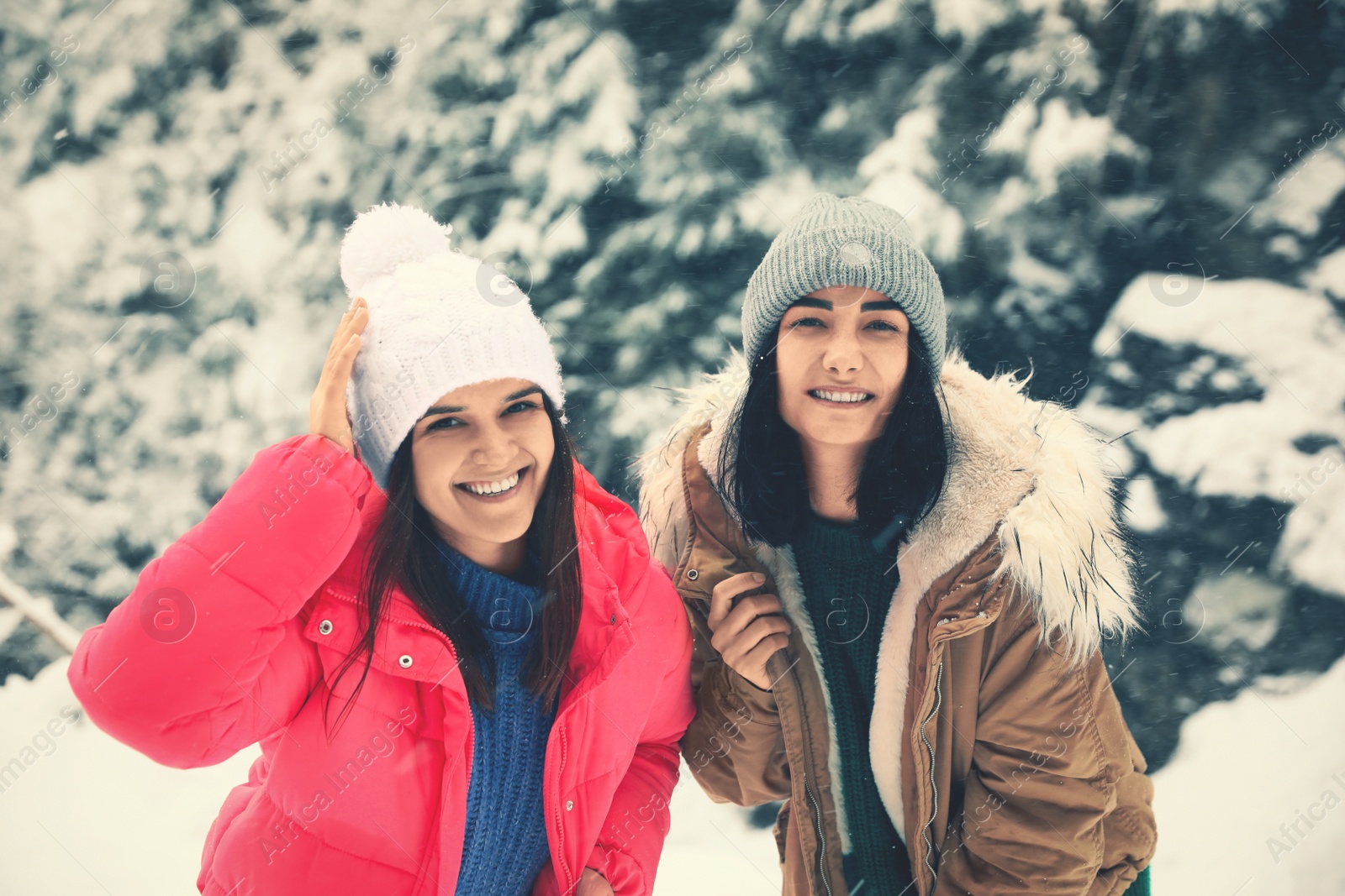 Photo of Friends outdoors on snowy day. Winter vacation