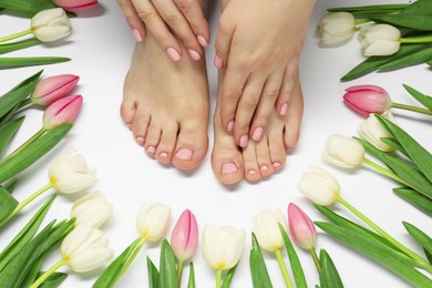 Photo of Woman with neat toenails after pedicure procedure on light background, closeup