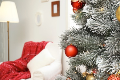 Photo of Stylish room interior with beautiful Christmas tree. Space for text