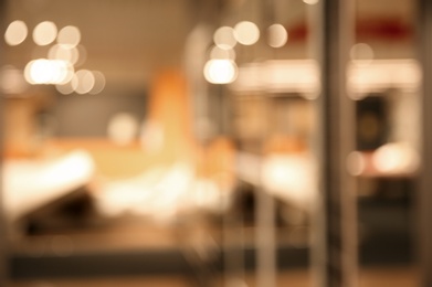 Blurred view of modern shopping mall interior