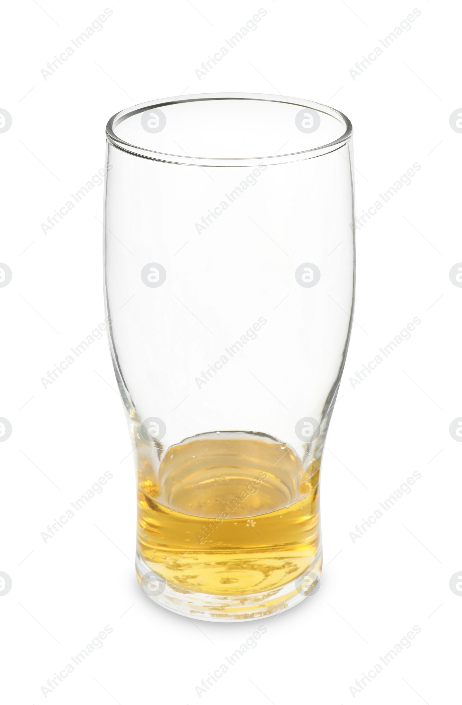 Photo of Almost empty glass of beer isolated on white