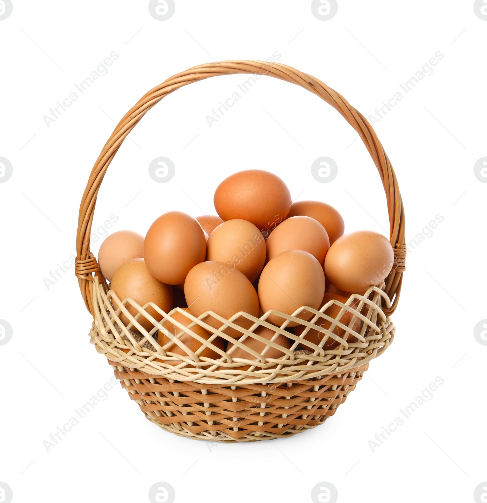 Photo of Chicken eggs in wicker basket isolated on white