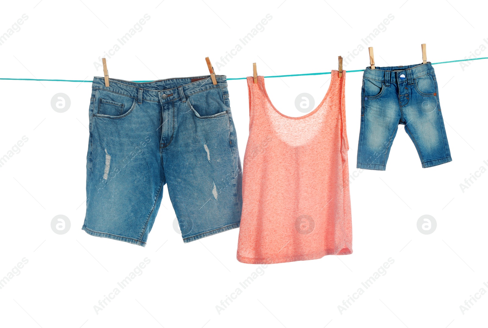 Photo of Clothes on laundry line against white background