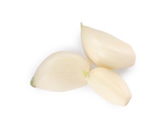 Peeled cloves of fresh garlic isolated on white, top view