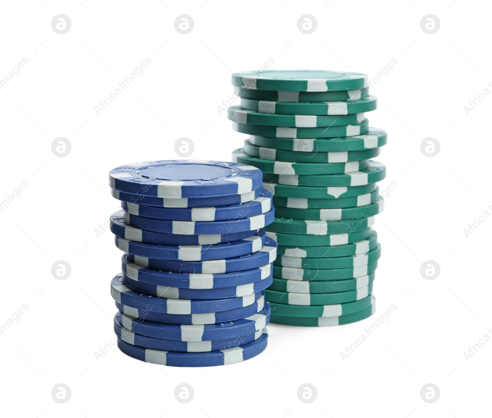 Photo of Plastic casino chips stacked on white background. Poker game