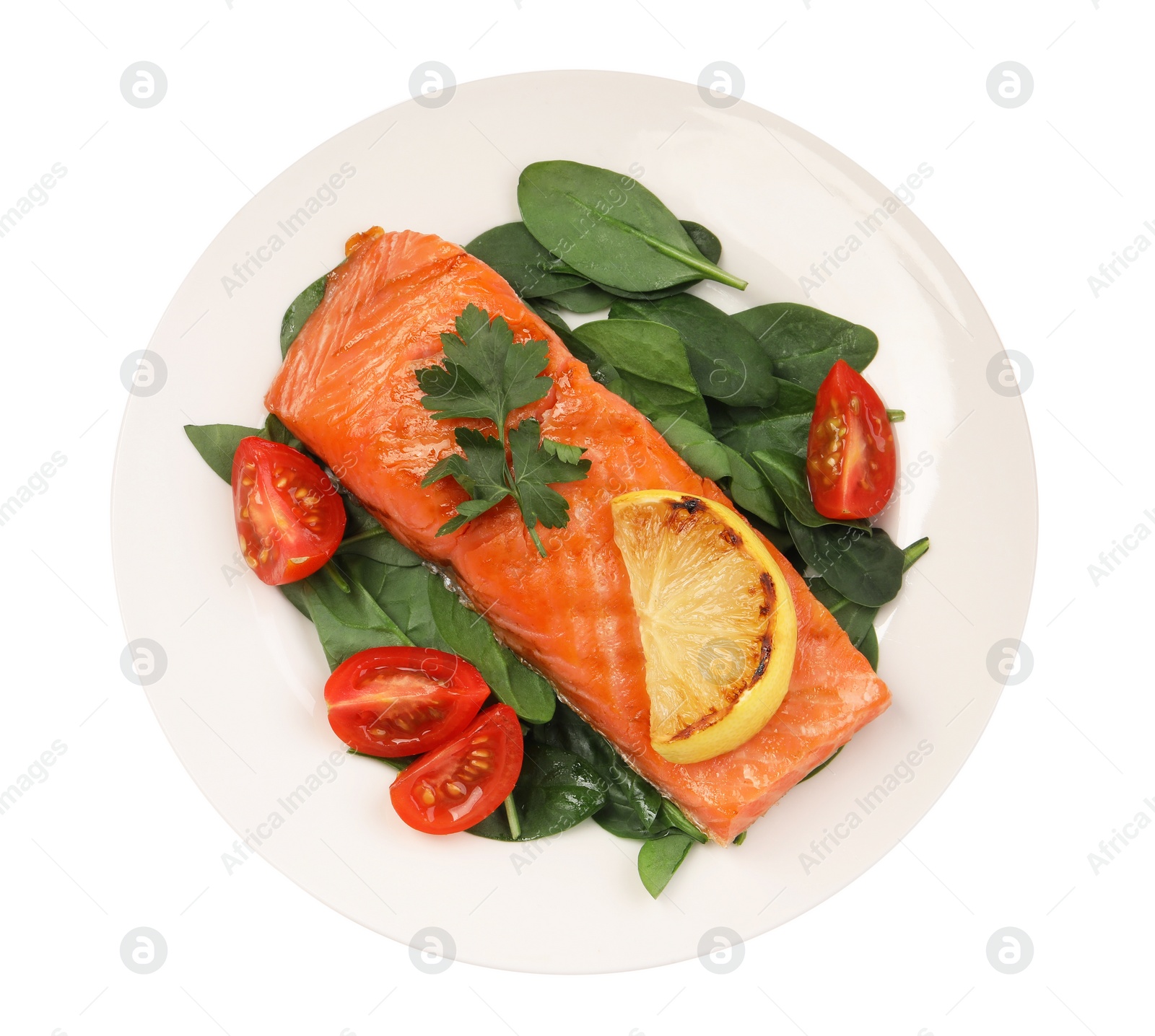 Photo of Tasty grilled salmon with tomatoes, lemon and basil isolated on white, top view