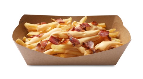 Tasty potato fries, cheese sauce and bacon in paper container isolated on white