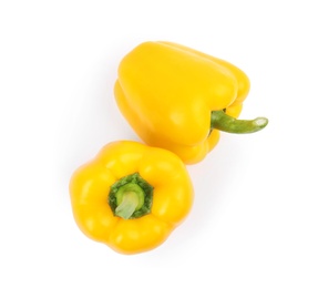 Photo of Ripe yellow bell peppers isolated on white, top view