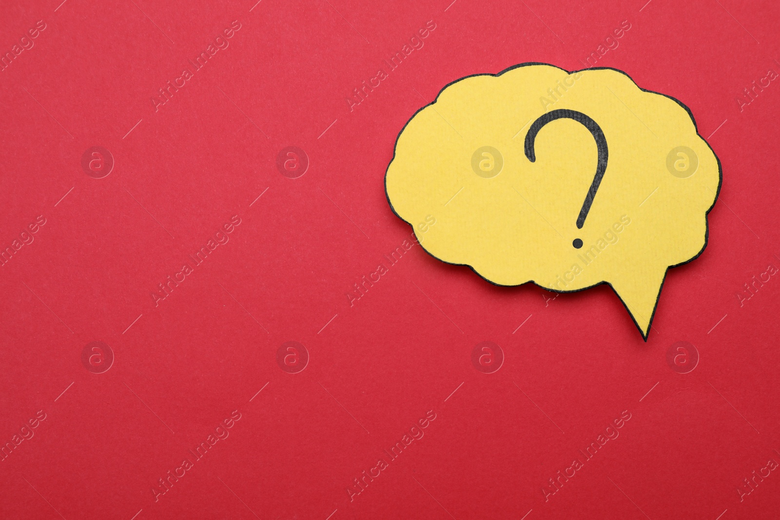 Photo of Paper speech bubble with question mark on red background, top view. Space for text