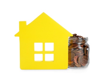 House model and coins on white background. Money saving concept