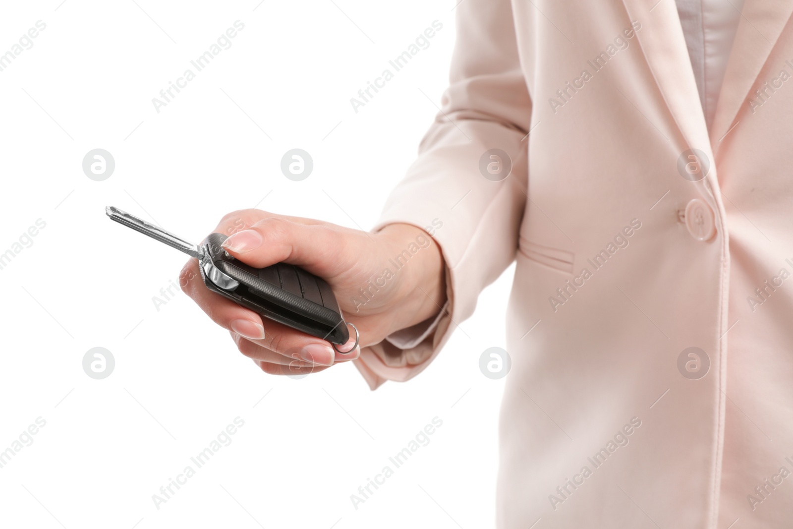 Photo of Woman holding car key isolated on white