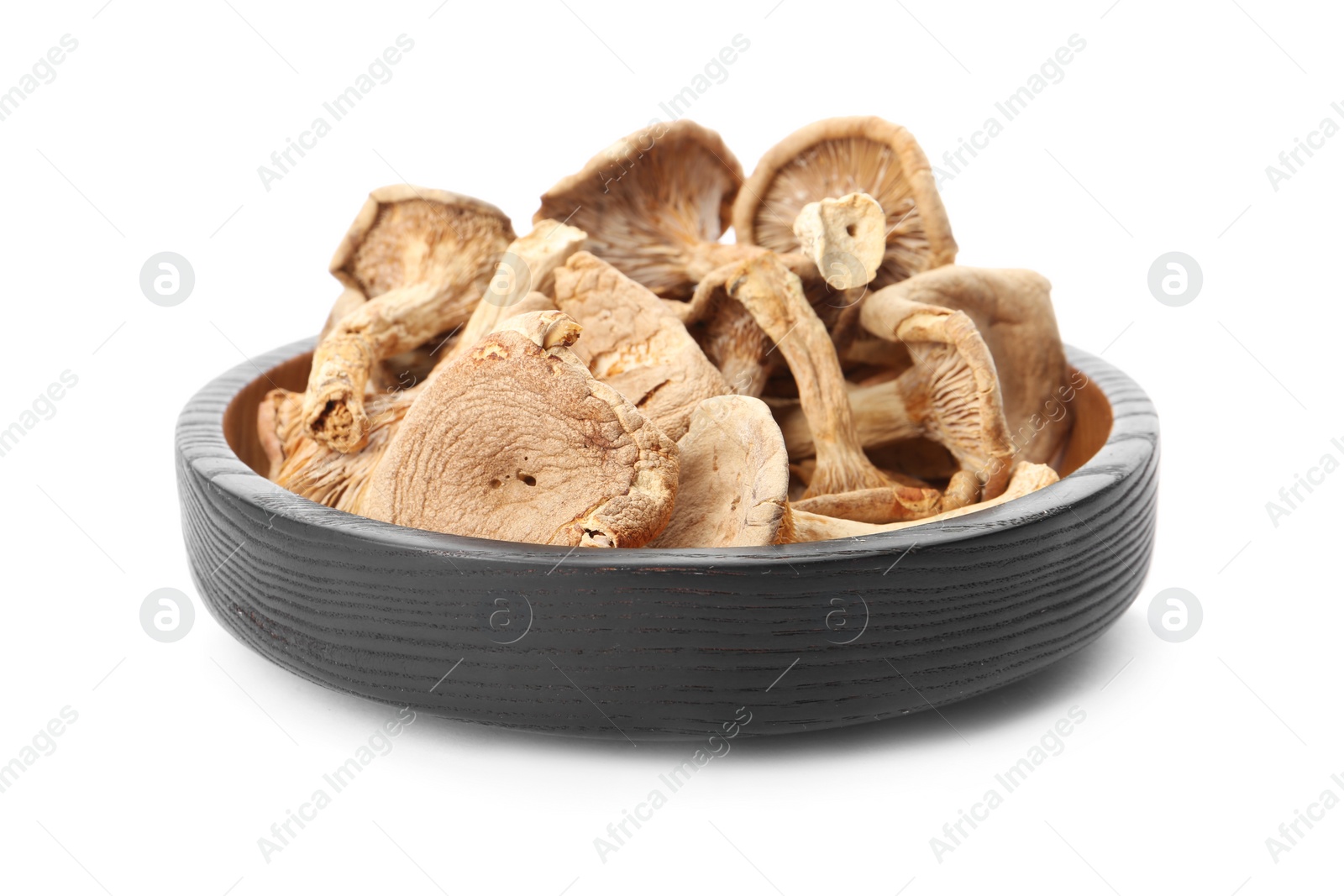 Photo of Plate of tasty dried mushrooms isolated on white